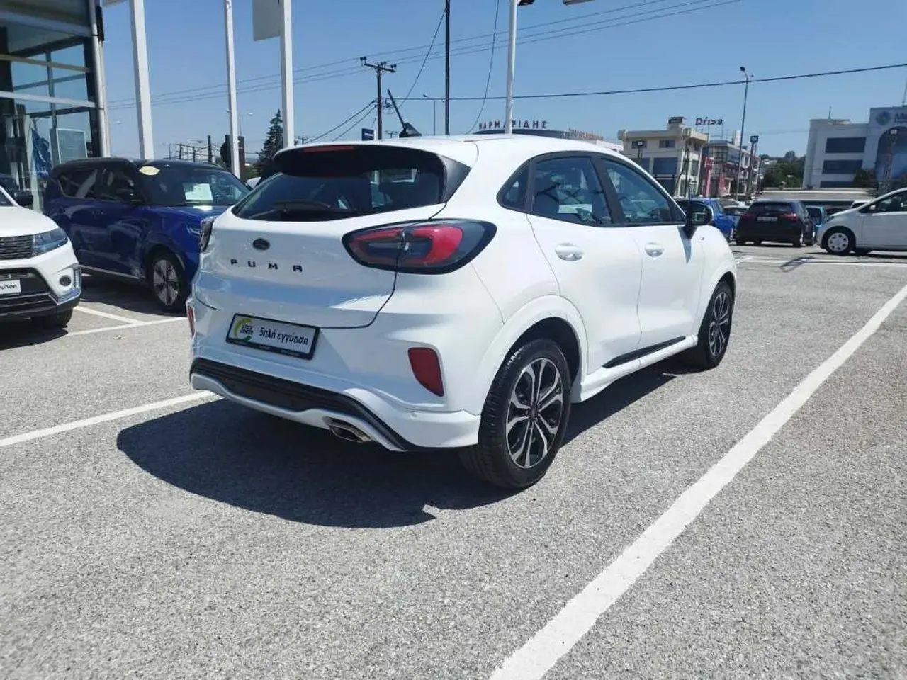 https://cdn.autoq.gr/websites/stock-center.gr/images/vehicles/ford-puma-5-hronia-eggyisi-l-tdci-st-line-aspro-2021/img_7342.jpeg