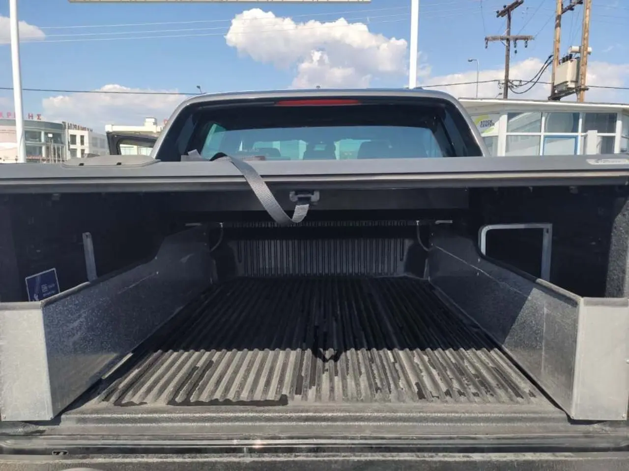 https://cdn.autoq.gr/websites/stock-center.gr/images/vehicles/ford-ranger-1-hrono-eggyisi-wild-track-mayro-2020/19_8.jpg
