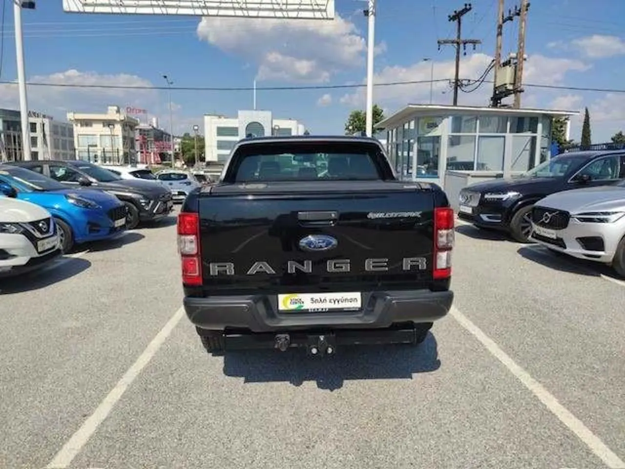 https://cdn.autoq.gr/websites/stock-center.gr/images/vehicles/ford-ranger-1-hrono-eggyisi-wild-track-mayro-2020/5_8.jpg