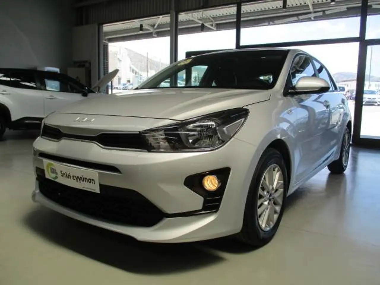 https://cdn.autoq.gr/websites/stock-center.gr/images/vehicles/kia-rio-5-hronia-eggyisi-instyle-gkri-2023/img_9083.jpg