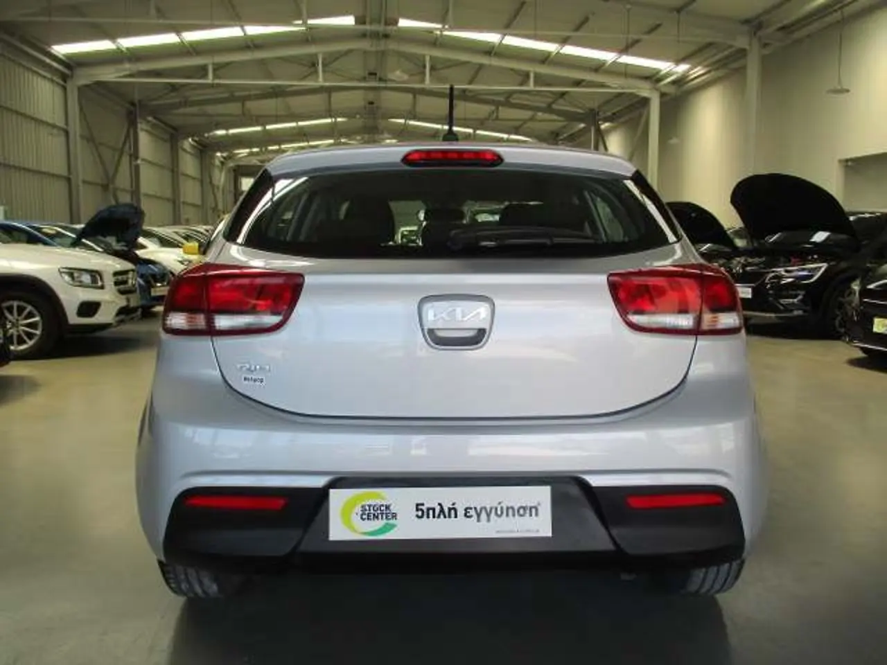 https://cdn.autoq.gr/websites/stock-center.gr/images/vehicles/kia-rio-5-hronia-eggyisi-instyle-gkri-2023/img_9085.jpg