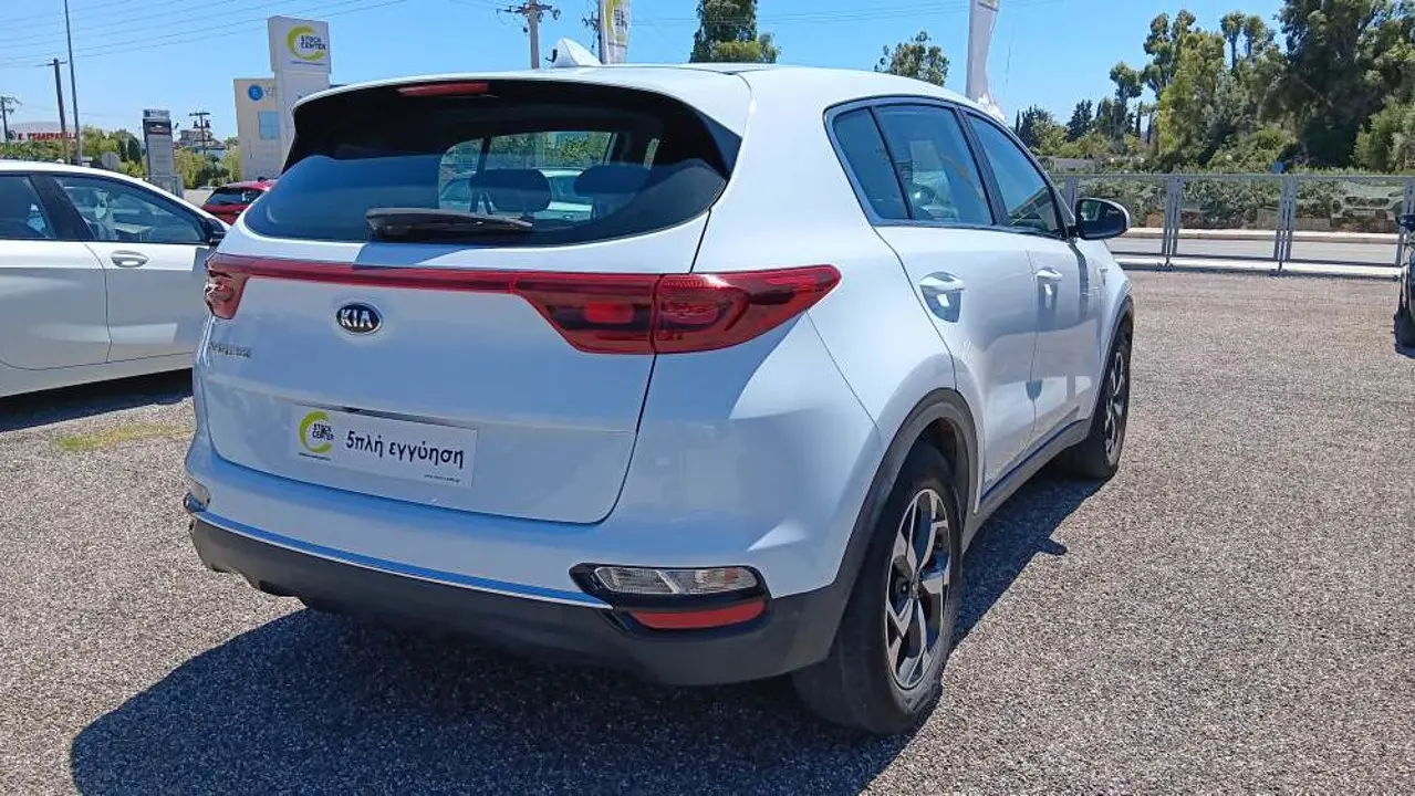 https://cdn.autoq.gr/websites/stock-center.gr/images/vehicles/kia-sportage-5-hronia-eggyisi-upgrade-aspro-2021/20250704_144224.jpg