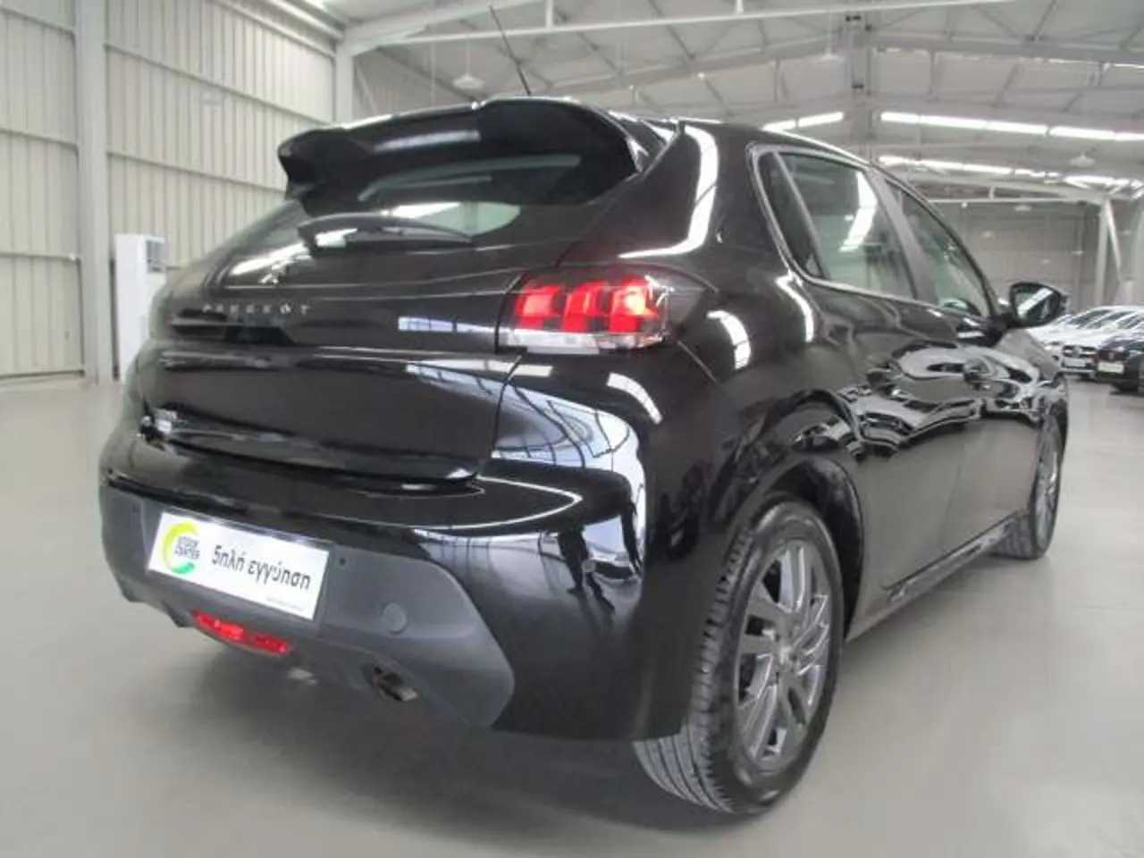 https://cdn.autoq.gr/websites/stock-center.gr/images/vehicles/peugeot-208-5-hronia-eggyisi-active-mayro-2021/img_7946.jpg