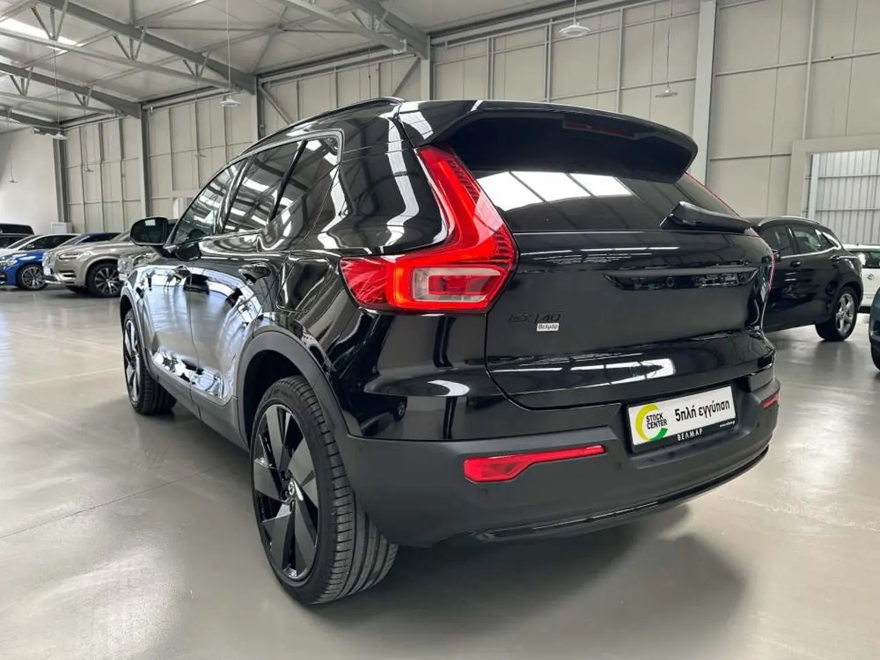 https://cdn.autoq.gr/websites/stock-center.gr/images/vehicles/volvo-xc40-5-hronia-eggyisi-eh40-plus-dark-edition-awd-mayro-2024/img_5307.jpg