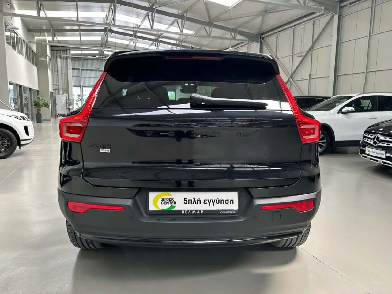 https://cdn.autoq.gr/websites/stock-center.gr/images/vehicles/volvo-xc40-5-hronia-eggyisi-eh40-plus-dark-edition-awd-mayro-2024/img_5308.jpg