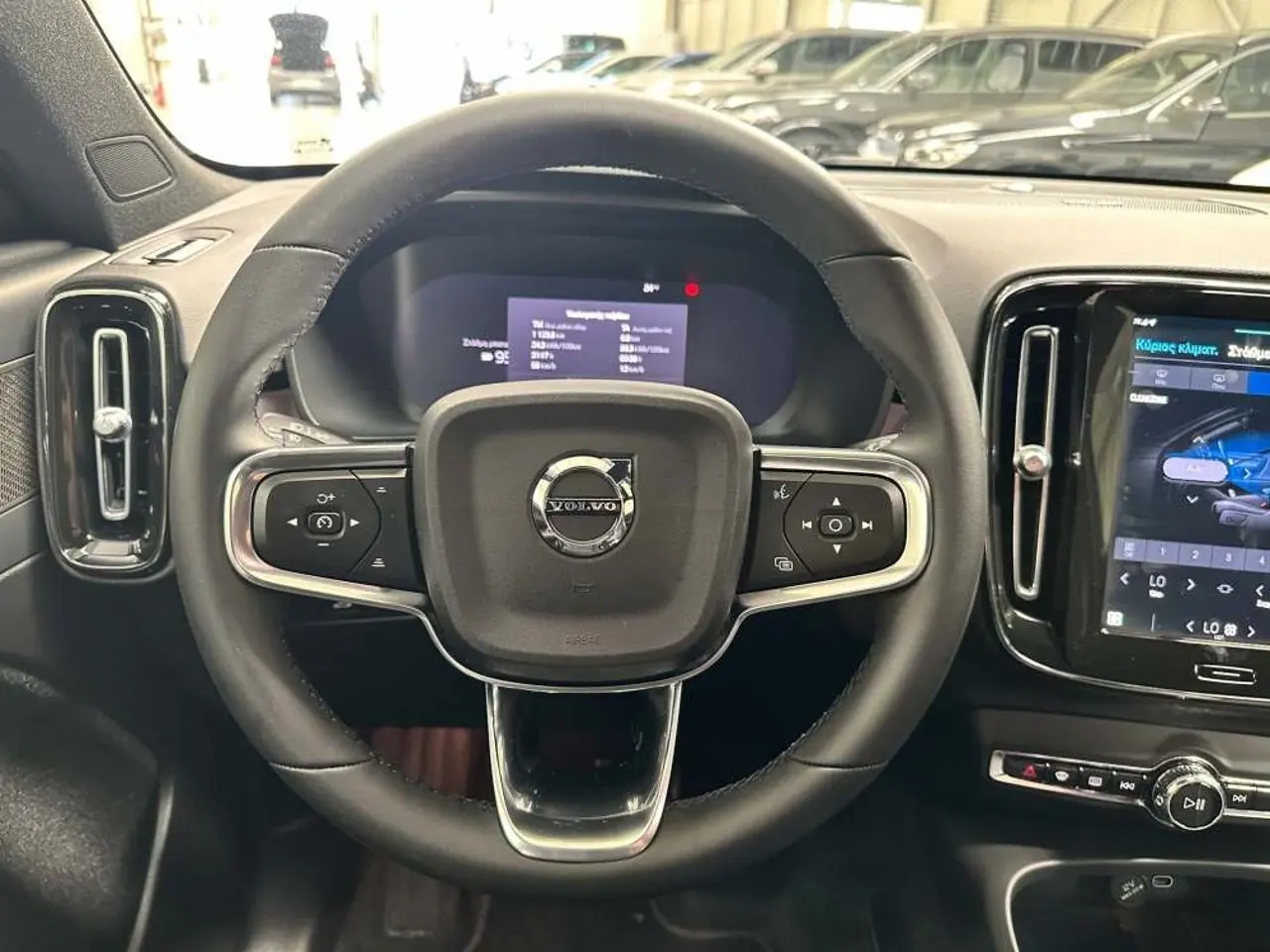 https://cdn.autoq.gr/websites/stock-center.gr/images/vehicles/volvo-xc40-5-hronia-eggyisi-eh40-plus-dark-edition-awd-mayro-2024/img_5314.jpg